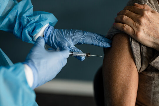 Up Close Shot Of Older Woman Getting The Vaccine