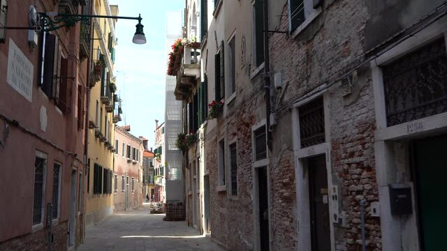 Venice, Italy - June 2021 - Walking through the less touristy streets of the lagoon city, among lesser-known canals, bridges and houses