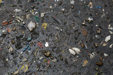 Aerial view of high quantities of trash inside a canal near Negro River, downtown Manaus, located...