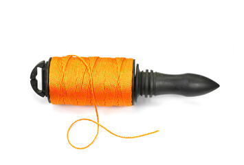 Roll of orange strong thread spool isolated on white