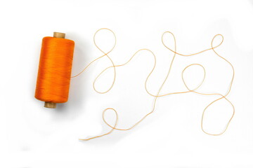 Color sewing threads isolated on white background.