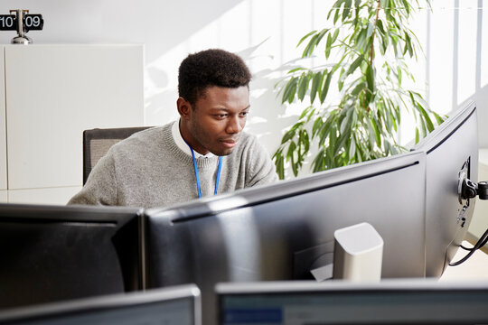 Black businessman working on computer