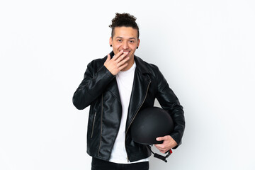 Fototapeta premium Caucasian man with a motorcycle helmet over isolated white background with surprise facial expression