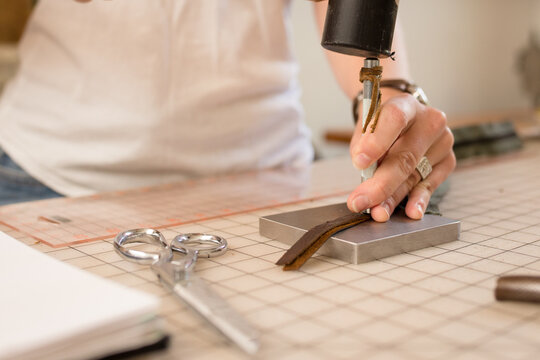 Closeup of grommet setting tool