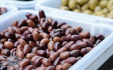 olives in the market. Background of olives close up. Healthy food background. Food concept.