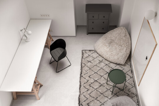 Interior of modern children's room with white walls