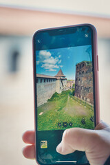 Taking a photo on a smartphone while traveling. Fortress Oreshek