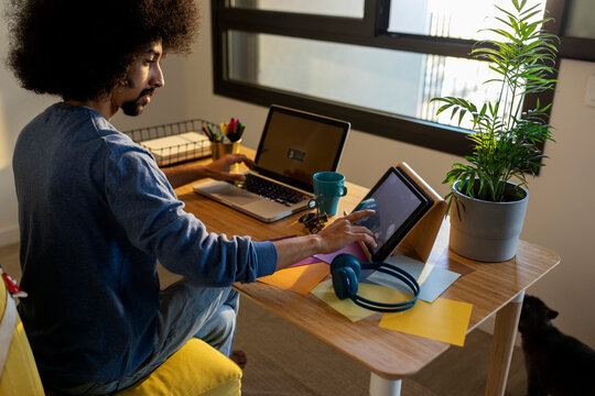 latin afro man working form home