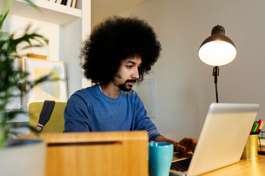 latin afro man working form home