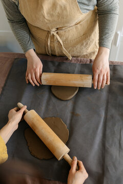 Two Women Work In A Ceramic Workshop
