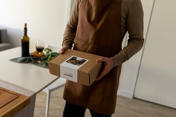 man holding food box meal kit