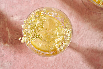 Elder flowers in a glass of lemonade. Summer drink