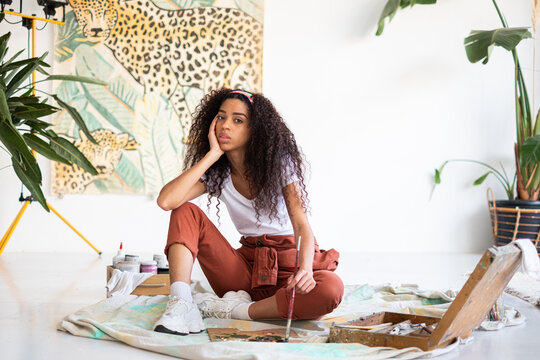 Lifestyle portrait of mixed race artist woman 