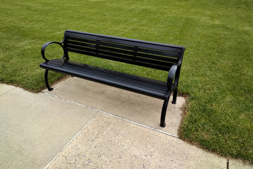 black metal park bench
