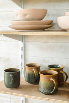 Shelves with products in a pottery workshop