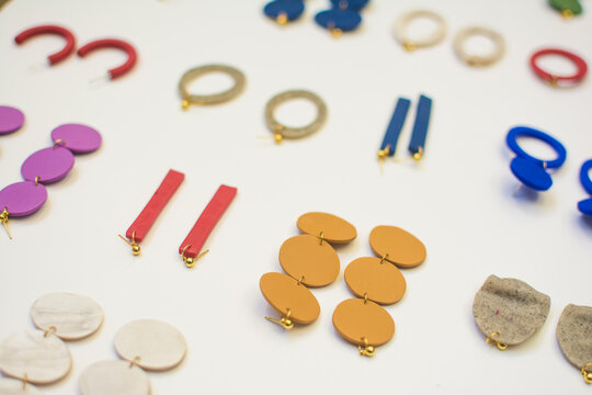 Earrings of different shapes and colors