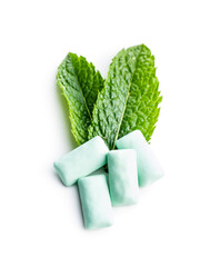Mint chewing gum pads and green mint leaves