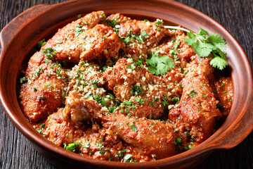 Chakhokhbili, stewed chicken in spicy tomato sauce