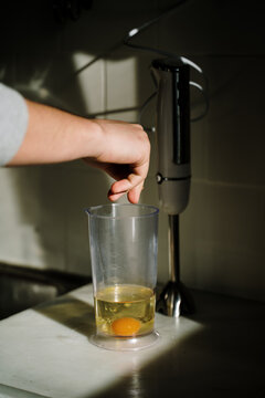 Man Making Mayonaise With A Hand Blender