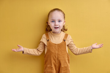 Close-up portrait of attractive lovely healthy glad cheerful girl enjoying good mood idea, solution, emotionally reacts on something, isolated on yellow pastel color background. copy space