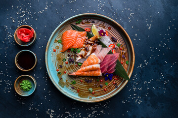 Sashimi set, Japanese food sashimi a traditional dish of raw fish served on the table with copy...