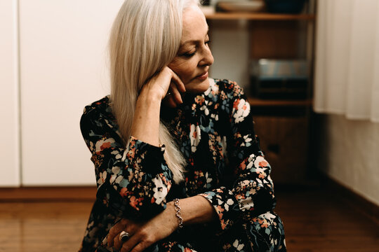 Senior Pretty Woman Relaxing At Bedroom 