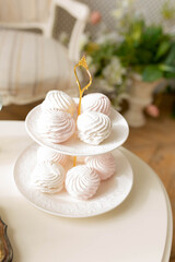 sweet marshmallows on a plate on a table