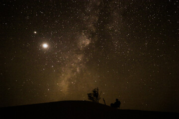 Naklejka na ściany i meble desert milky way photography, stars in the night