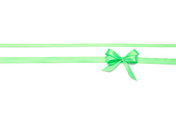 Beautiful green ribbons with bow on white background