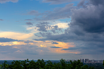 Gray blue sky and beautiful columnus clouds. View from below. It's going to rain soon.