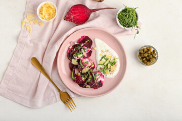 Composition with delicious beetroot carpaccio on light background