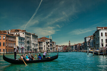 gondolas at sunset in Venice at sunset hour - obrazy, fototapety, plakaty