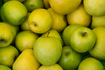 green apples in a market
