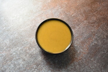 Fresh spicy green chilli sauce in bowl