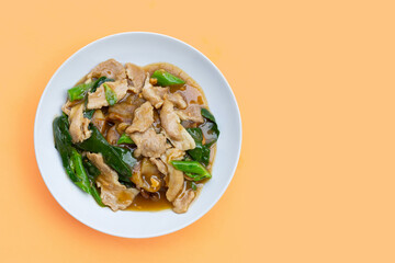 Fried flat noodle with pork and kale in gravy sauce