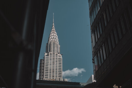May 18, 2021 - Manhattan, New York: Chrysler Building view. Historical sightseeing, glorious. Toned image. Copy space for text