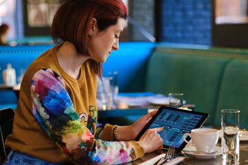 a woman is engaged in stock trading