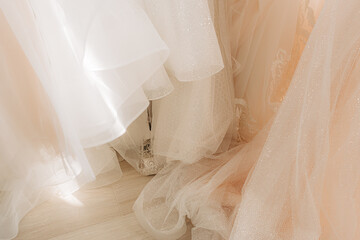 Group of wedding dresses in a bridal shop
