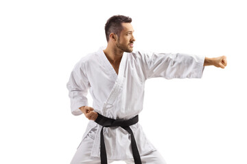 Man in kimono exercising karate