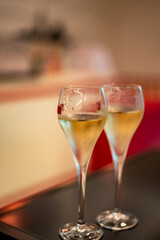 Tasting of cold brut Champagne sparkling wine  in underground cellars of wine house in Reims, Champagne, France