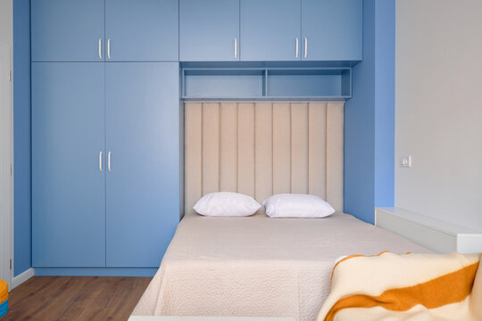 Modern bedroom in bright colours.