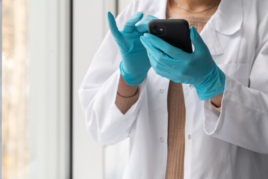 Anonymous Researcher Using Cellphone