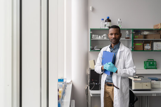 Biologist Holding Folder