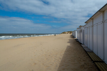 Yellow sandy beach in small Belgian town Knokke-Heist, luxury vacation destination, summer holidays