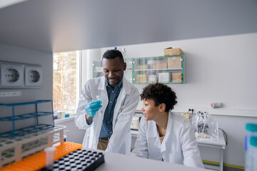 Two Scientist Working In Laboratory