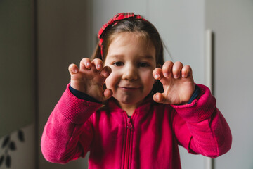 Tough Little Girl Showing her Claws