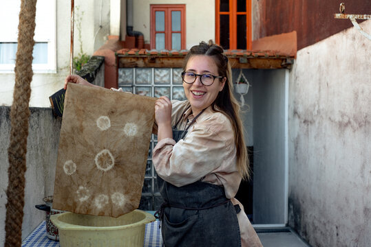 Happy woman showing the dyeing results