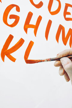 Street Artist Working In Studio On Typography