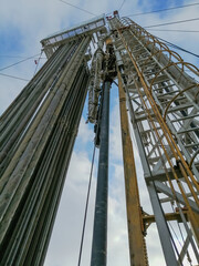 Drilling rig for drilling oil and gas. Inside view. There are drill plugs for lowering into the...