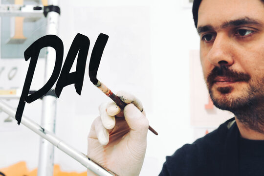 Street Artist Working In Studio On Typography